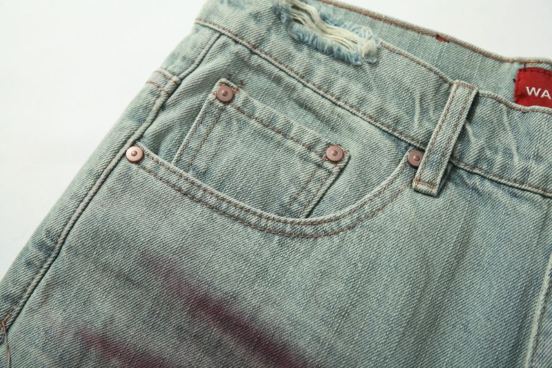 BLAZING SPRAY BOOT CUT DENIM JEANS