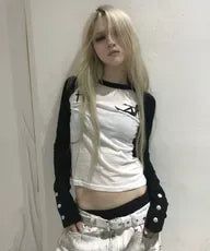 Kyoiii（キョイ）の「トリガーガールラグランティー (Slim Fit)（トップス）」