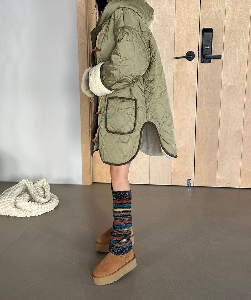 a quilted padded jacket with wool