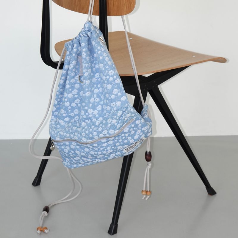 ROSSMOOR（ロスムーア）の「Floral denim string backpack_light blue（Bags）」