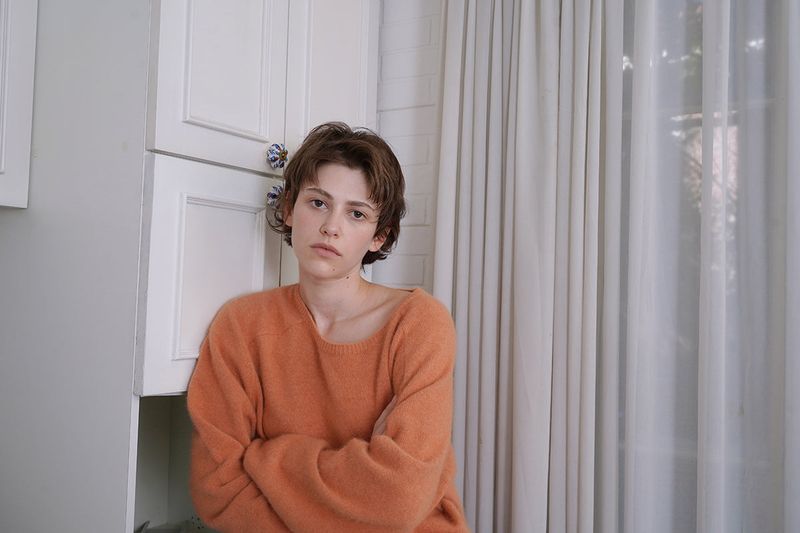 Cuddle raccoon knit_orange