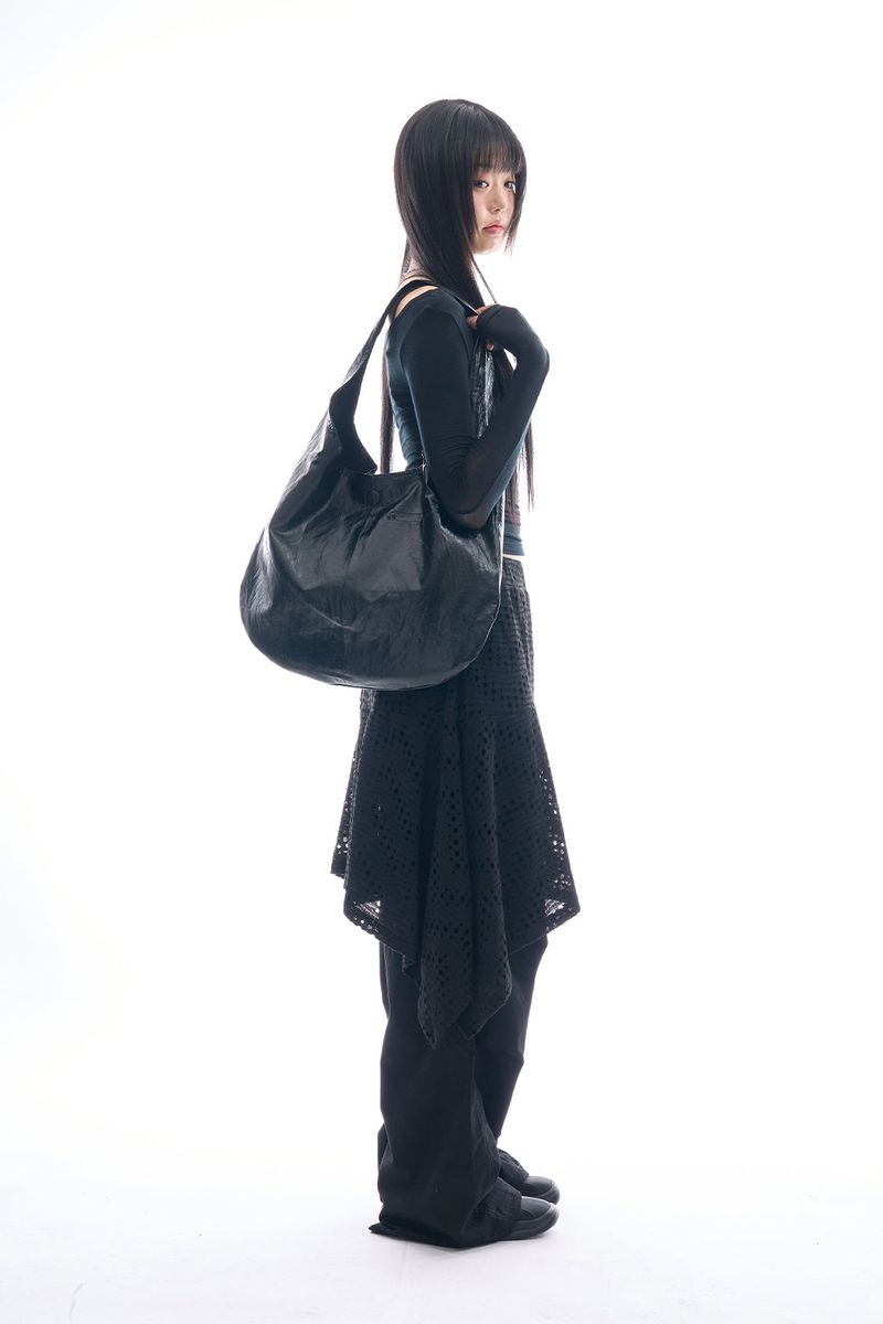 Raucohouse（ラウコハウス）の「Maelle glossy leather shoulder bag（Bags）」