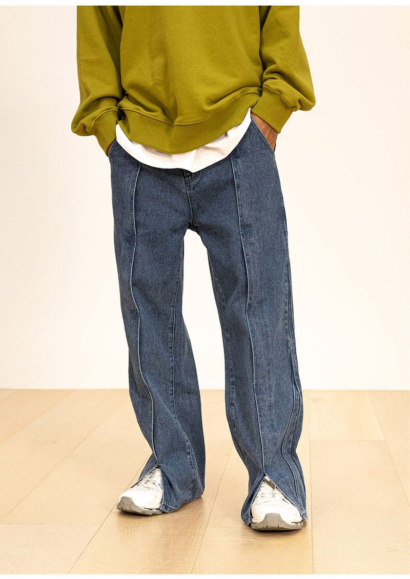 INCISION INVERTED WASHED DENIM PANTS