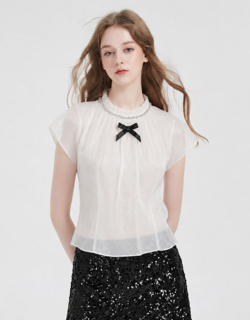TWEEDY-A（ツウィーディア）の「Spiral Crystal Ribbon Sheer Mock Neck Blouse White（Tops）」