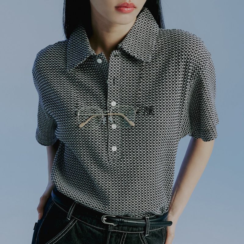 ROMANTIC CROWN（ロマンティッククラウン）の「RECENT BUTTON KNIT POLO_BLACK（Tops）」