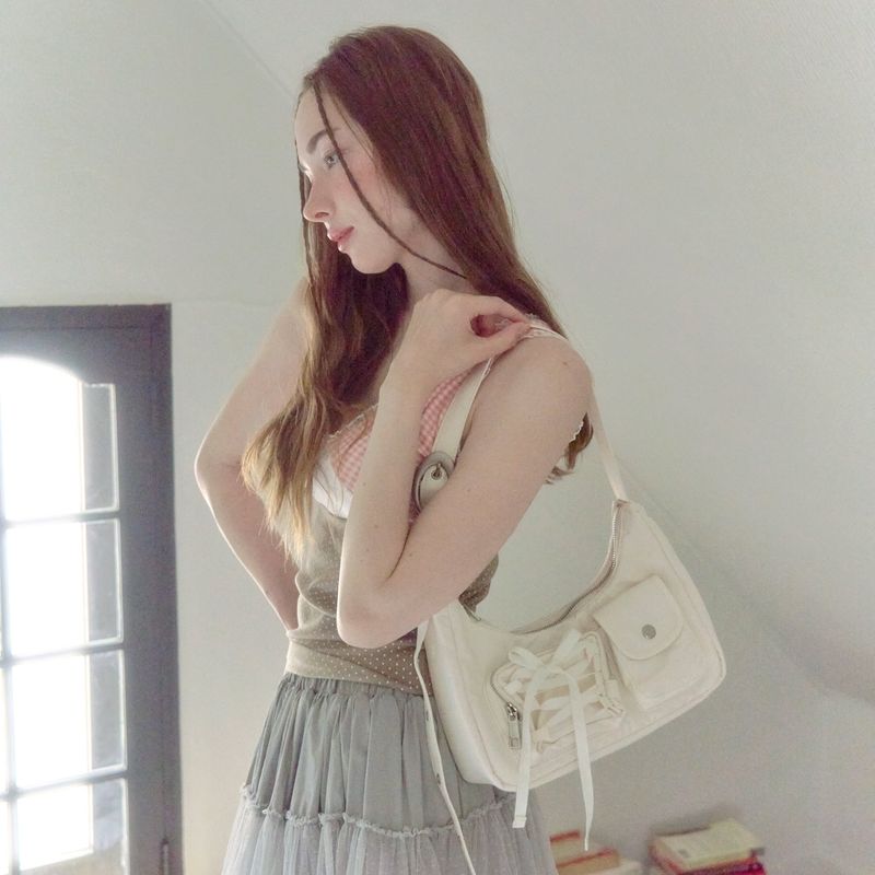 cozing(コジング)の「Nylon ribbon hobo bag_ivory(Bags)」