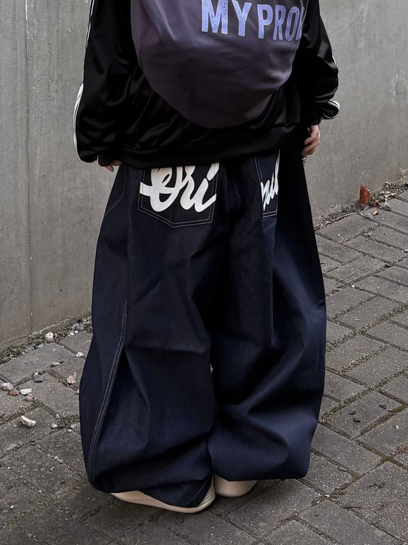 back letter raw denim pants