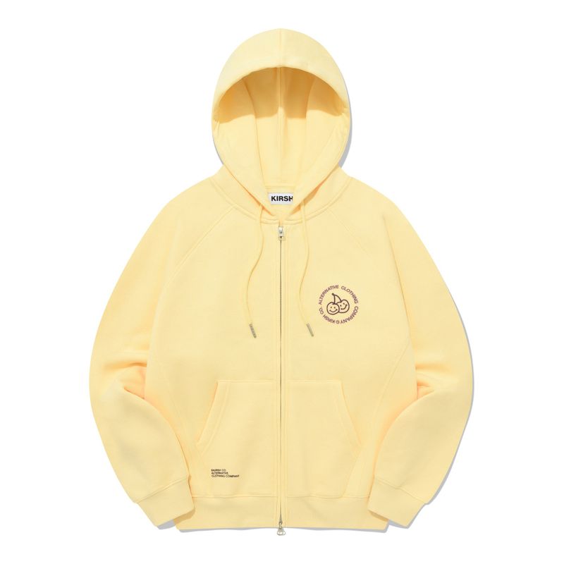 KIRSH（キルシー）の「DOODLE CHERRY CIRCLE LOGO NAPPING HOODIE ZIP UP [YELLOW]（Tops）」