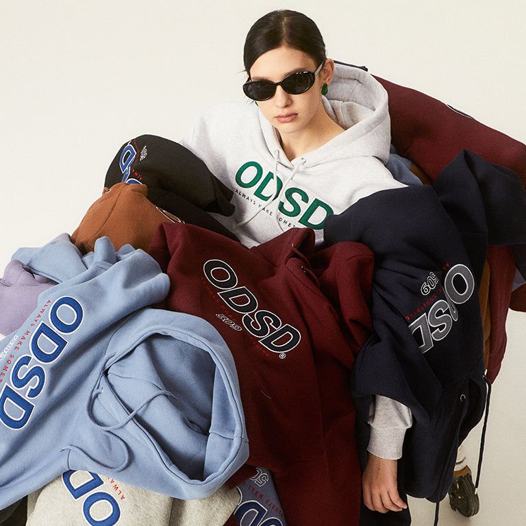 ODDSTUDIO(オッドスタジオ)の「ODSD LOGO APPLIQUE CROPPED HOODIE - 8COLOR(Tops)」