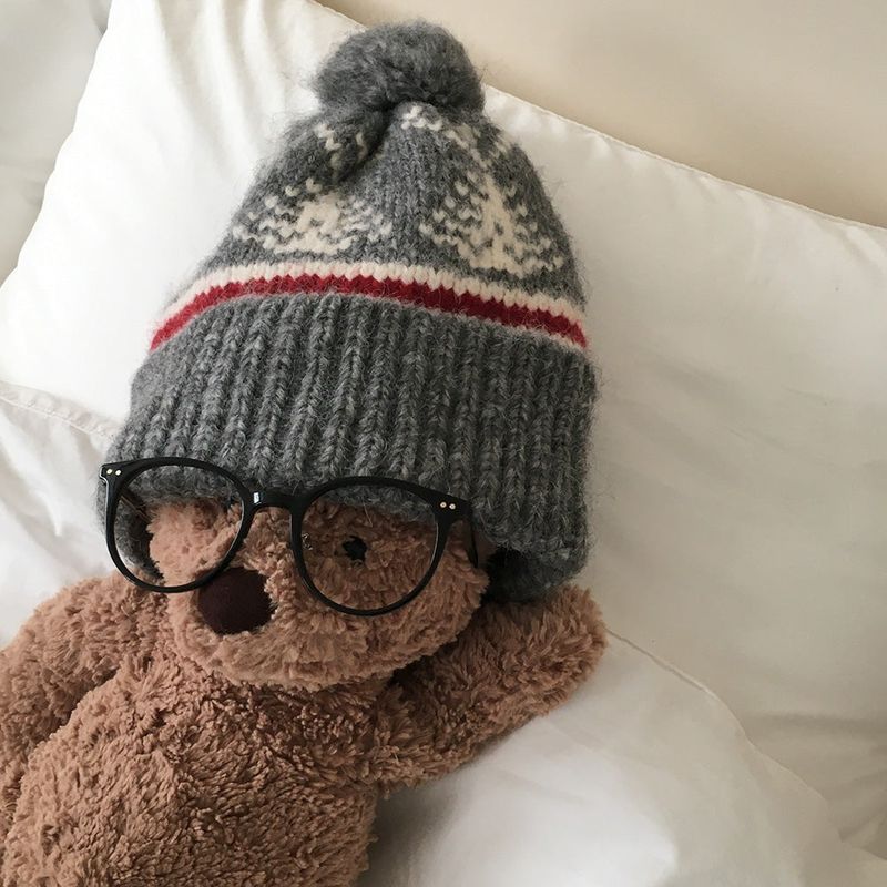 pompon Nordic knit cap