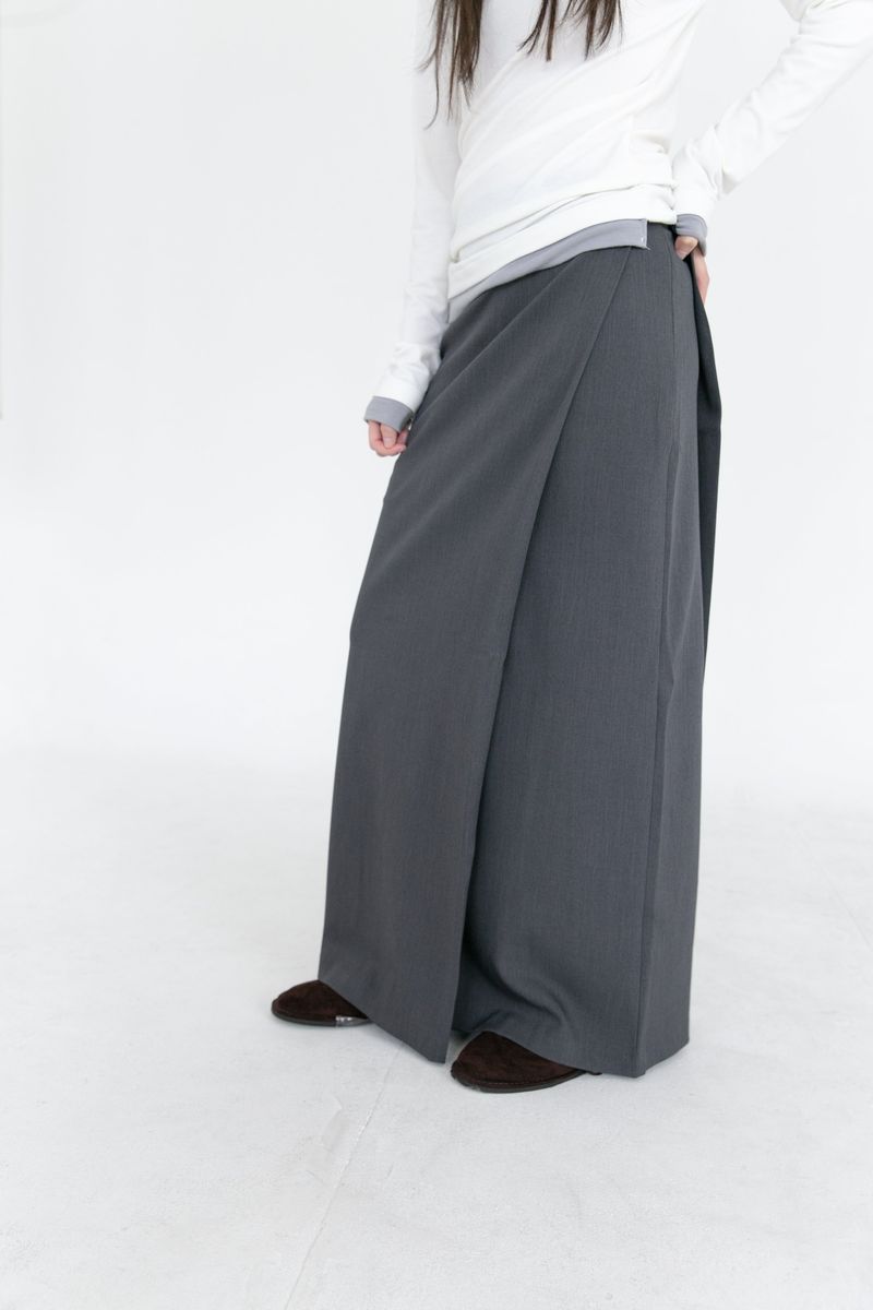 omoosoohy（オムスヒ）の「modern wrap lip-pocket skirt(2colors)（Skirts）」