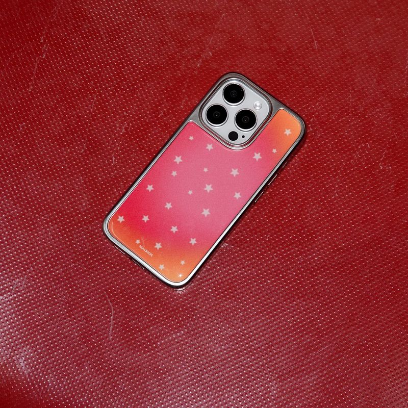 nullbieve（ヌルビーブ）の「スターリーナイトシルバーエポキシケース. レッドオレンジ（スマホグッズ/小物）」
