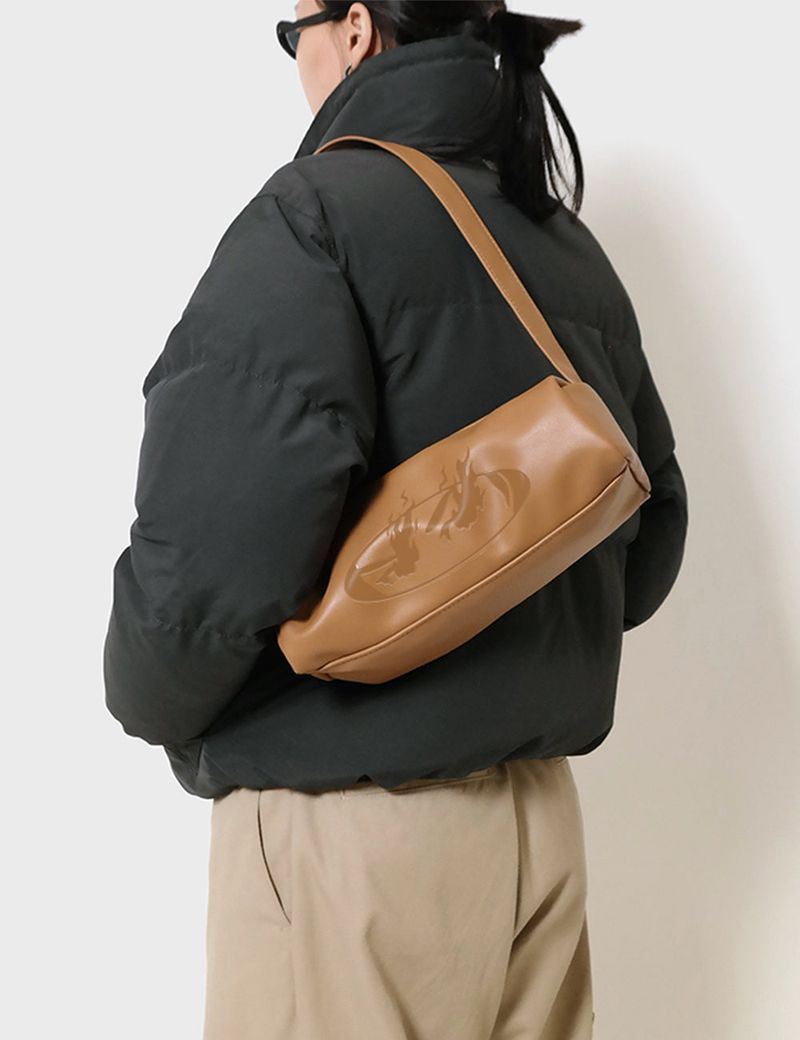 INNEQ（イネク）の「the eye bag camel（Bags）」