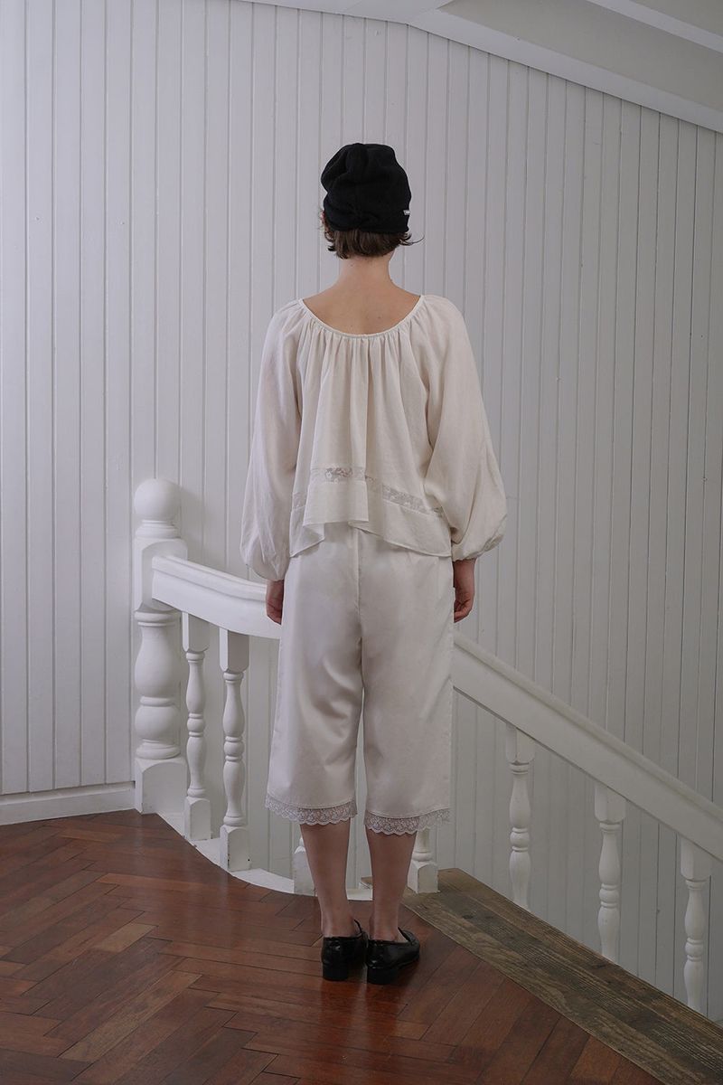 Pale lace blouse