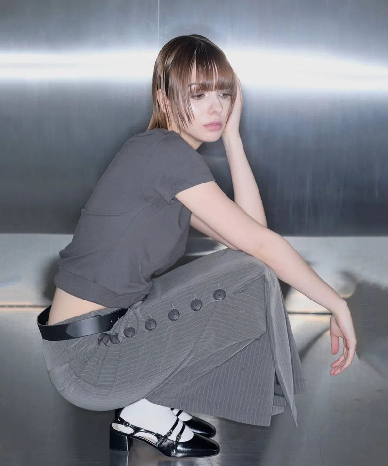 MUCENT（ムセント）の「TILT STRIPE BUTTON POINT LONG SKIRT（Skirts）」