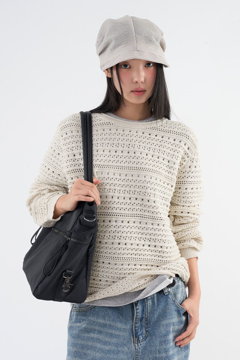 Raucohouse(ラウコハウス)の「Pinocchio Punching Knit(Tops)」