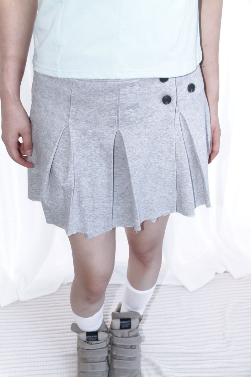 BUTTON POINT PLEATED MINI SKIRT (2COLOR)