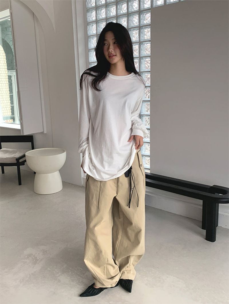 CURVED TUCK COTTON TROUSER