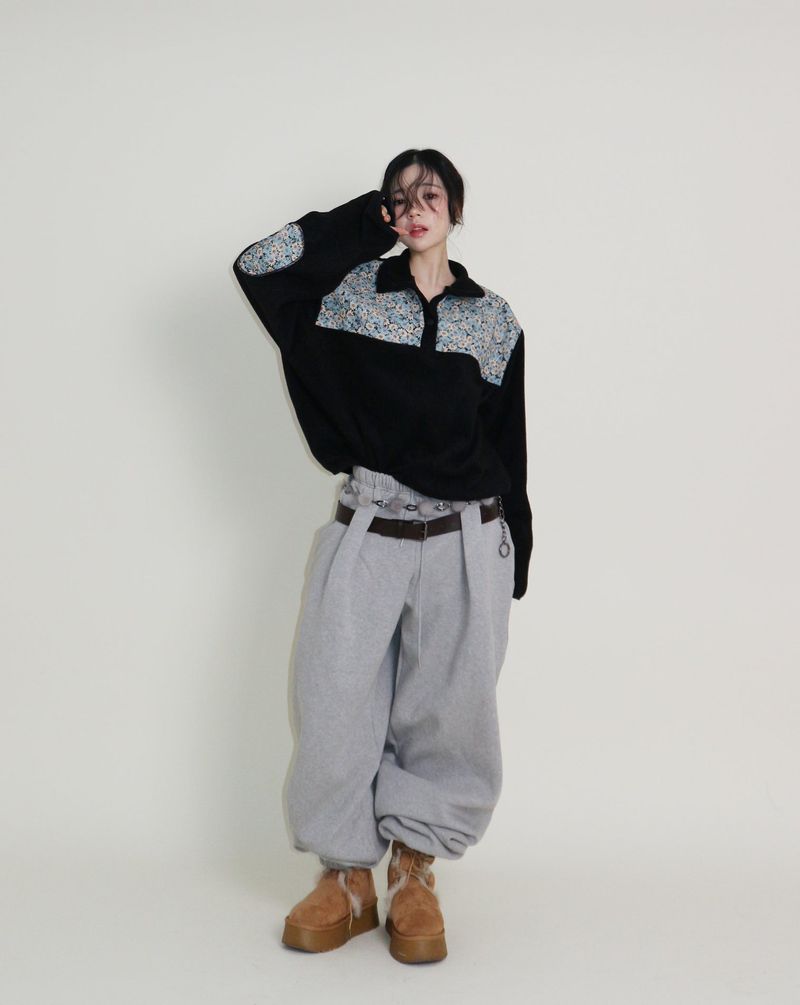 UZYOUNG（ユズヨン）の「ファムフラワーパターンキルティングフリース長袖Tシャツ (Button Detail)（トップス）」