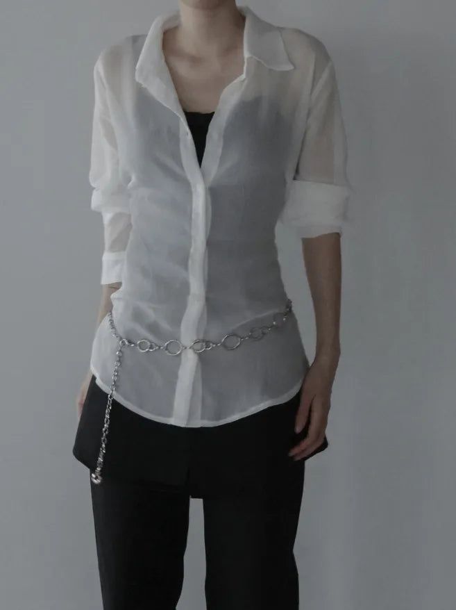 mnem（ムネム）の「Nua See-through Wrap Blouse（Tops）」