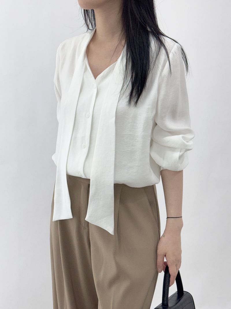 Bleak tie button long-sleeve blouse