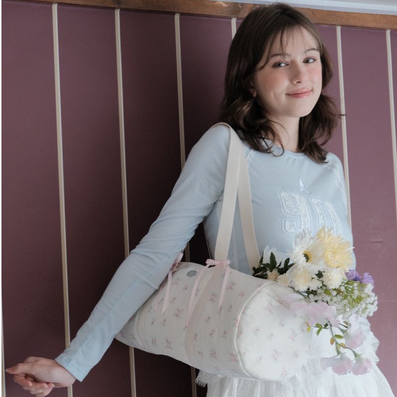 cozing(コジング)の「Glow duffle bag_floral(Bags)」