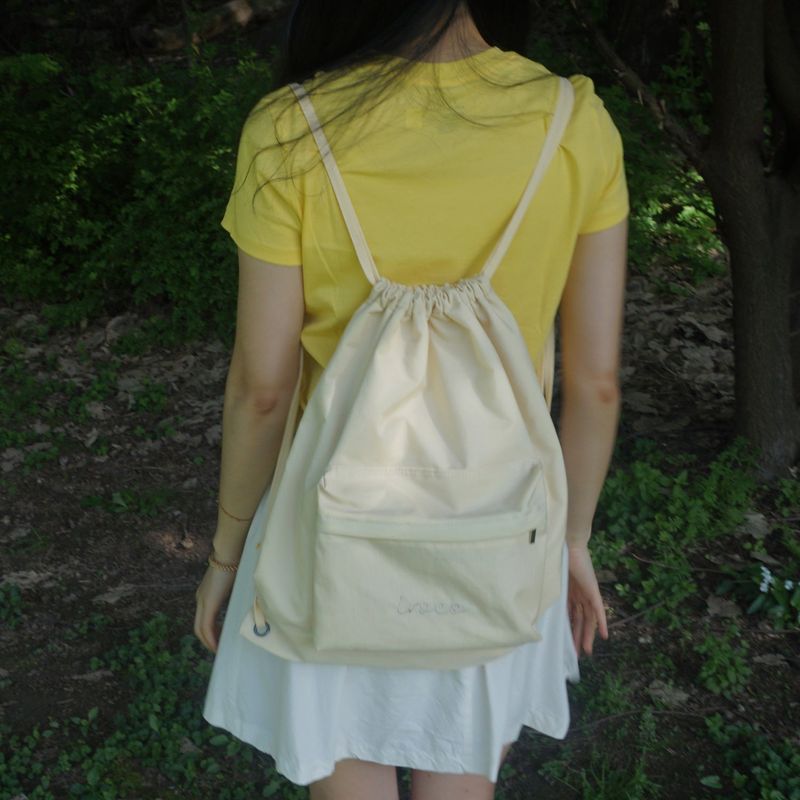 logo nylon string backpack_yellow