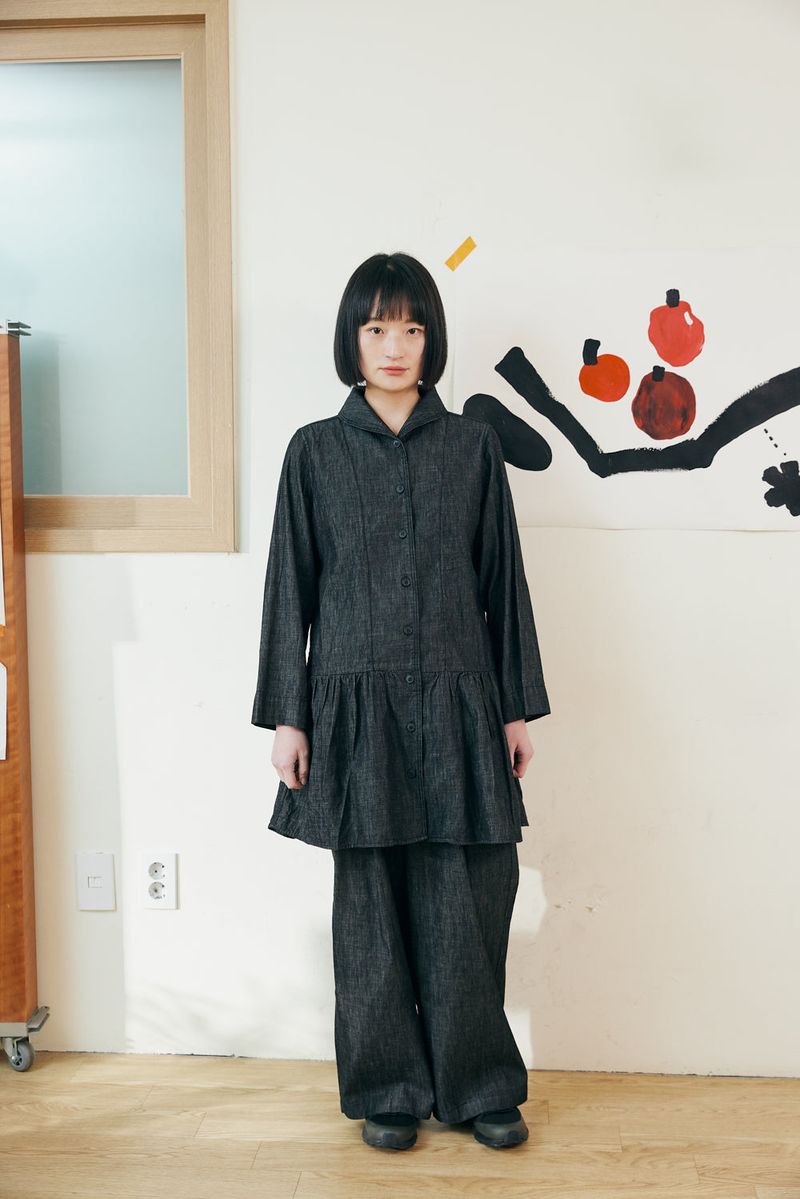 Frill shirt ops / Black jeans