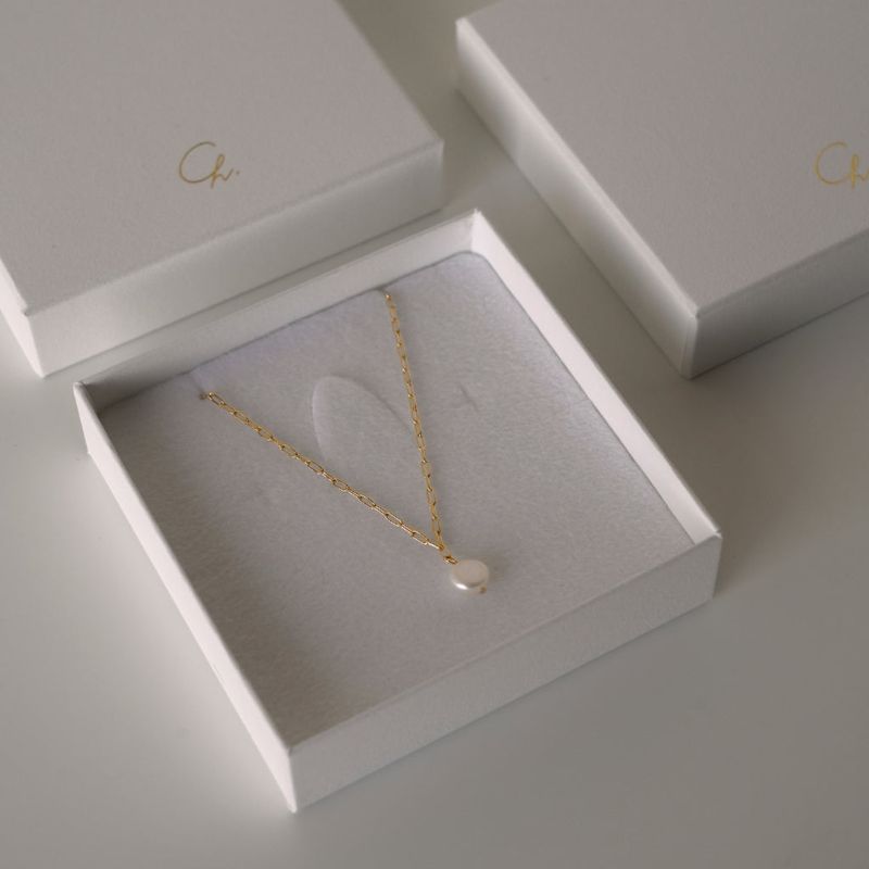 pearl Ritys necklace
