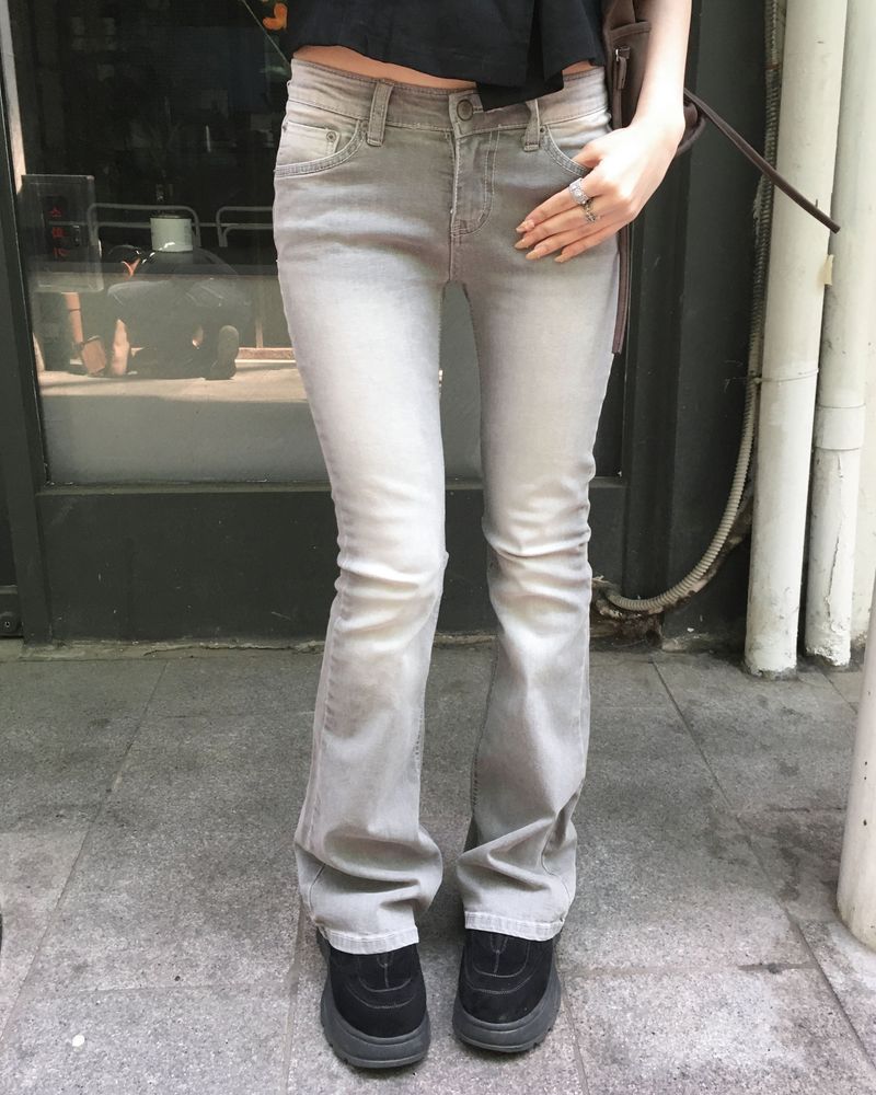Grey lowrise boots cut pants