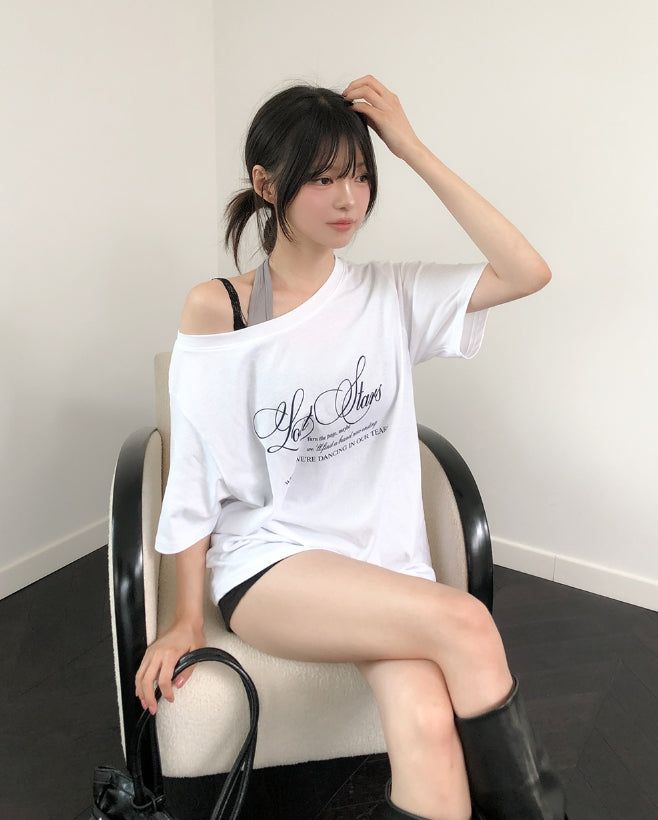 ULAN（ユレン）の「Stars Lettering Unbalance Short Sleeve（Tops）」