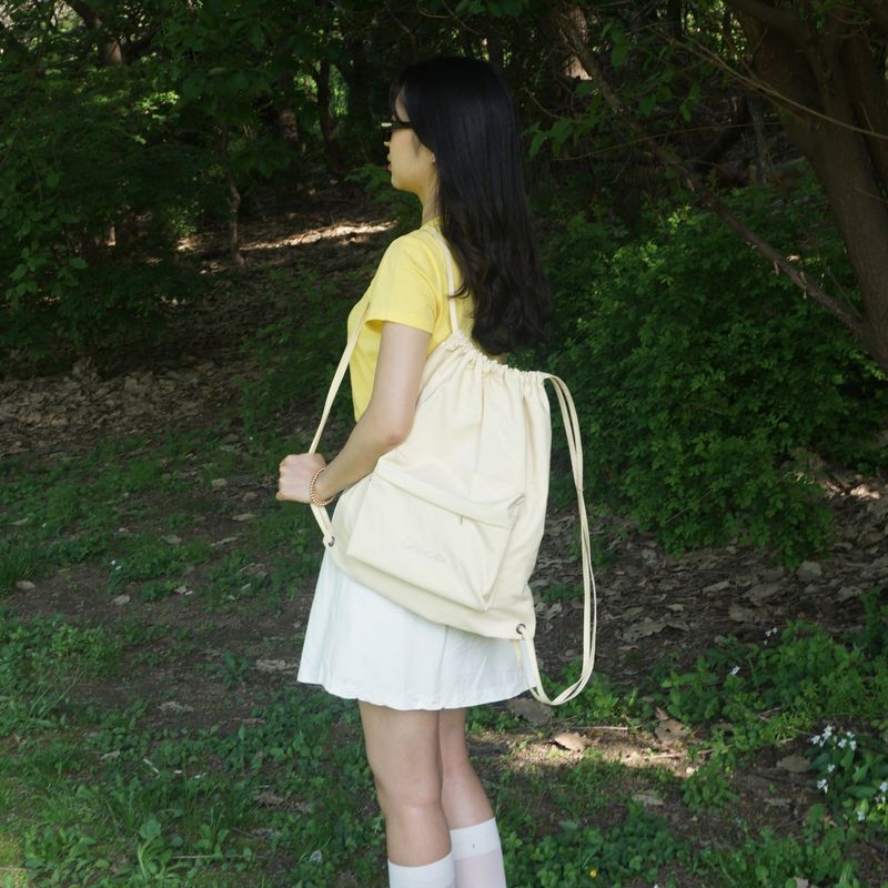 logo nylon string backpack_yellow