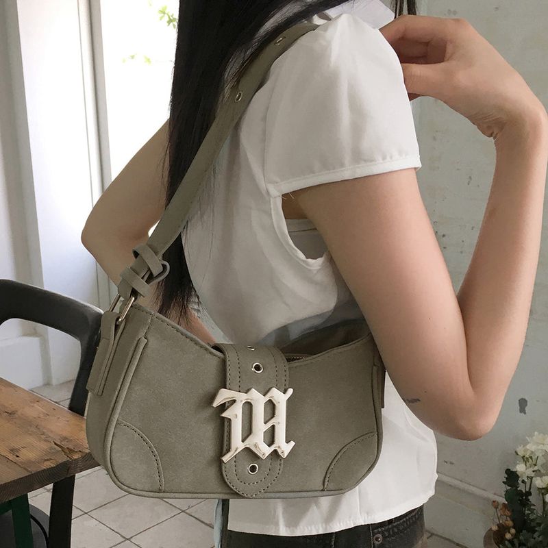 WONDER WONDER（ワンダーワンダー）の「Kroll logo buckle suede washed cross hobo shoulder bag（Bags）」