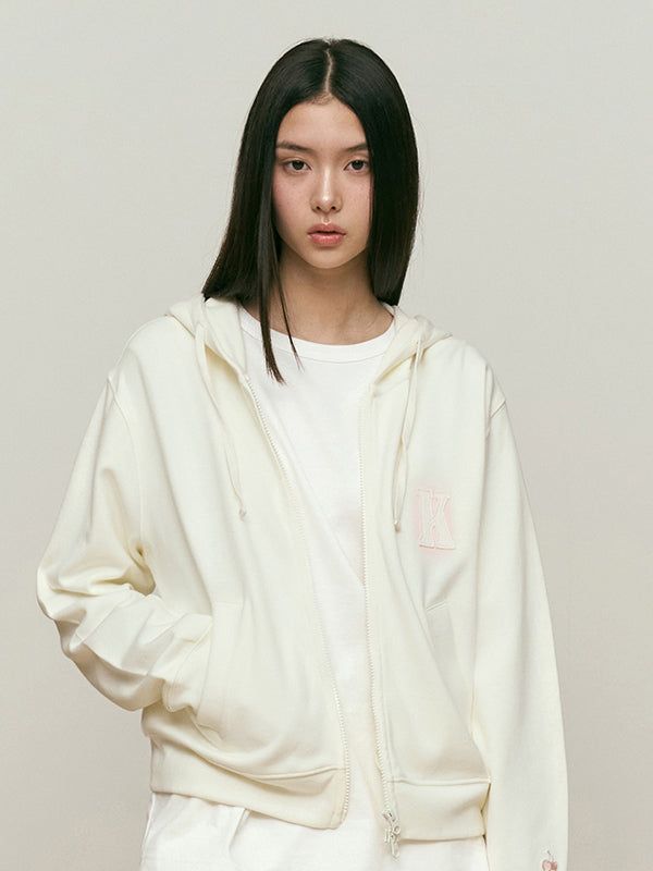 KIRSH（キルシー）の「WORDING APPLIQUE HOODIE ZIP UP [IVORY]（Tops）」