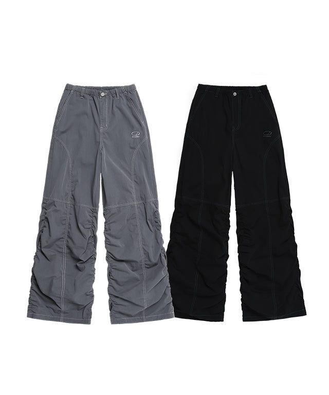 ODDSTUDIO（オッドスタジオ）の「斜めカットステッチシャーリングパンツ（パンツ）」