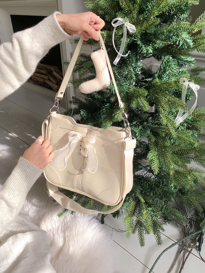 ovuni（オーブニ）の「Bustier ribbon bag_ivory（Bags）」