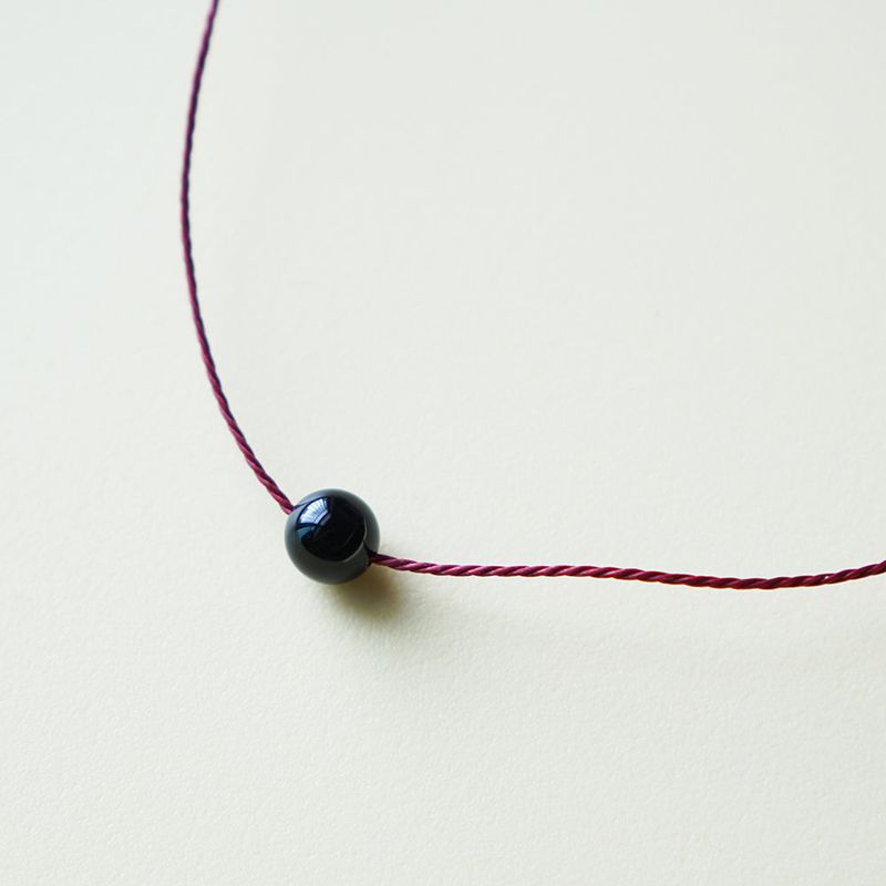 BLACK BALL ROPE BRACELET