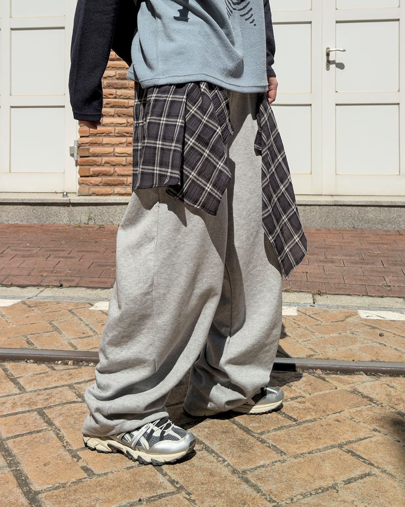 JIIGEUM（ジグム）の「ヘイデン シャツ レイヤード スウェットパンツ（パンツ）」