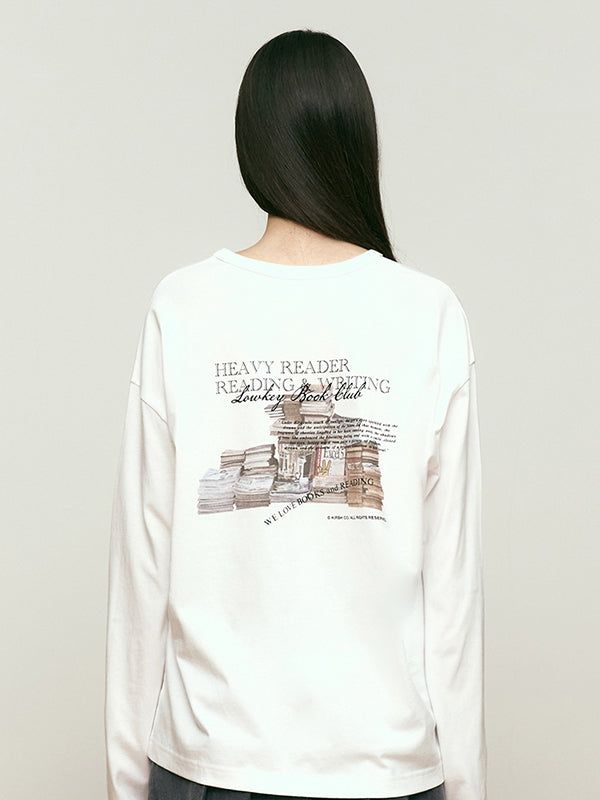 KIRSH（キルシー）の「BOOKCLUB GRAPHIC LONG SLEEVE [WHITE]（Tops）」