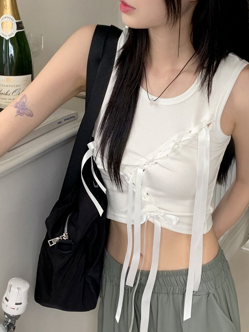 WONDER WONDER(ワンダーワンダー)の「Hino Balletcore Eyelet Ribbon Cropped Sleeveless(Tops)」
