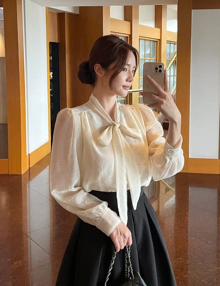 iam mari（アイアム マリ）の「Cave Pearl Tie Puff Blouse（Tops）」