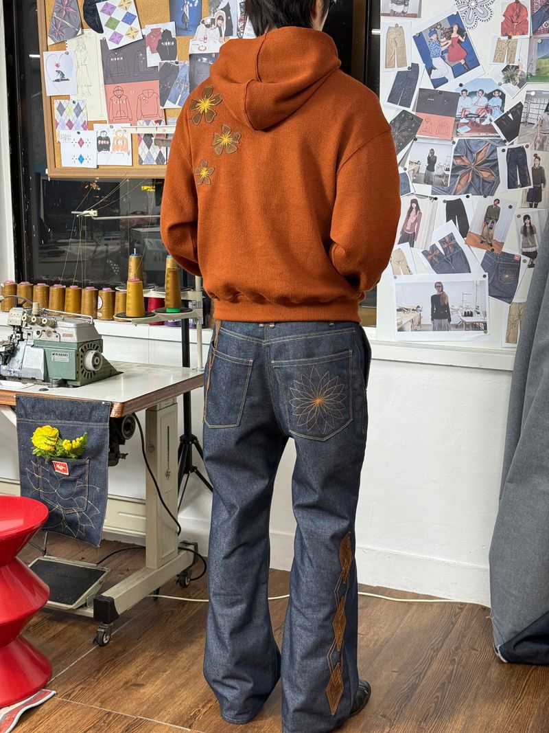 GGOTT（ゴット）の「[Hand-Made「006」] アーガイルパッチパンツ_デニム＆ブラウン（パンツ）」