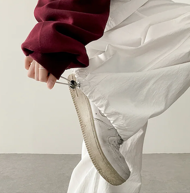 Log banding layered pocket skirt pants