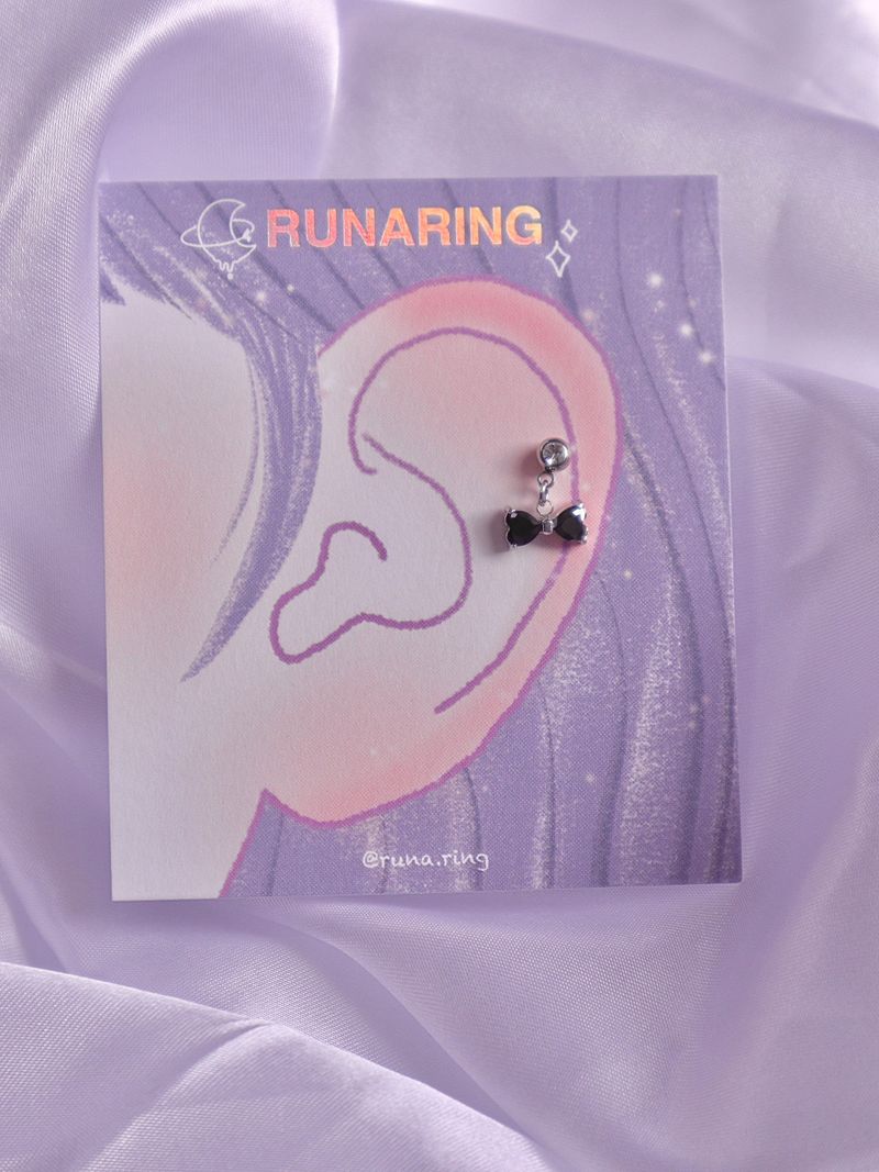 Surgical steel black ribbon piercing