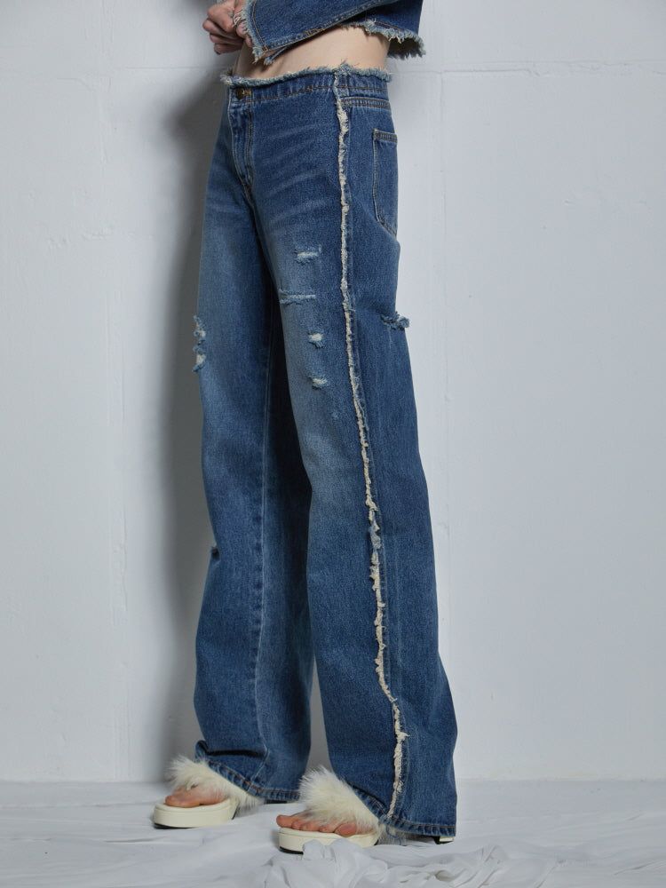 FRINGED DENIM PANTS