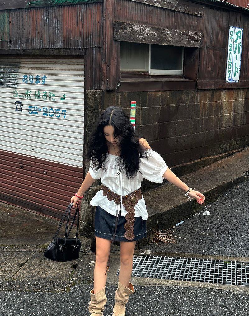 a raw paper stitch jean skirt