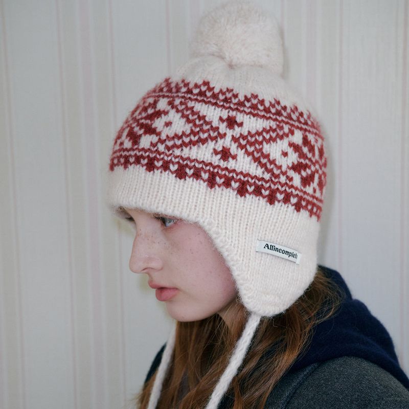 ALLINCOMPLETE（オールインコンプリート）の「Snowflake Jacquard Earflap Beanie (Ivory)（Hats）」