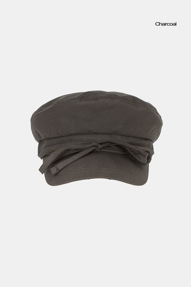 Shelby string newsboy cap
