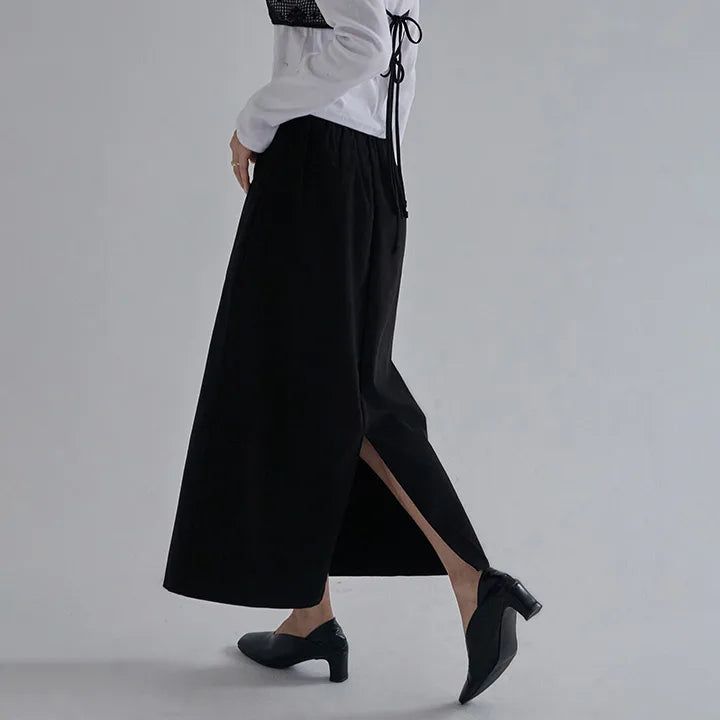[Jenito] Back-Banded A-Line Slit Long Skirt - 2 Colors