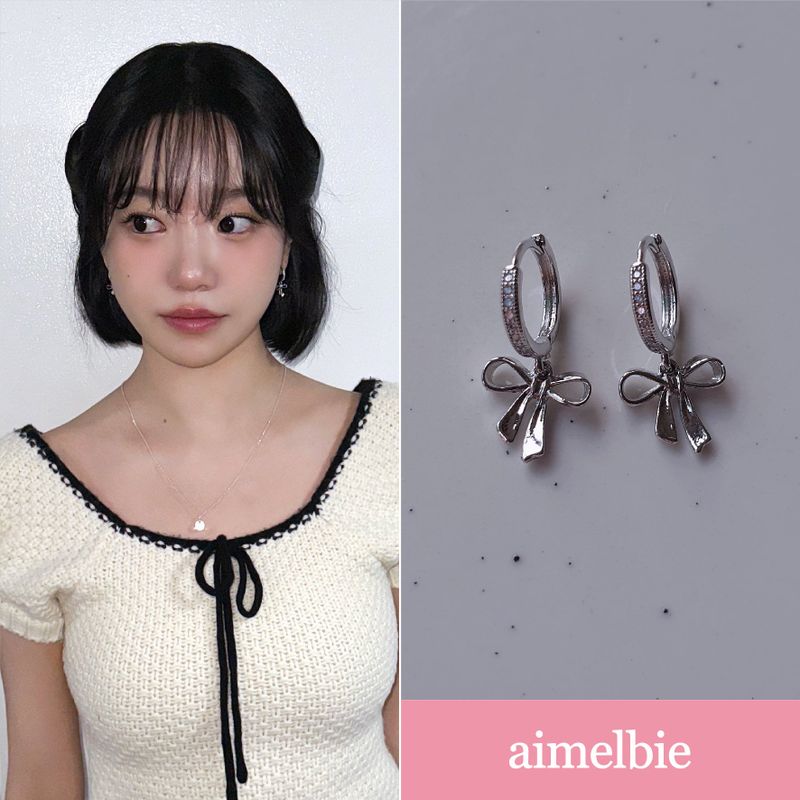 aimelbie（アイメルビー）の「[Jo Yuri Earrings] リトルバレットリボンハグピアス - シルバーカラー（アクセサリー）」